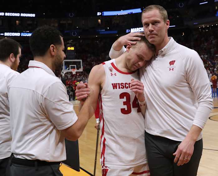 Wisconsin assistant coach Joe Krabbenhoft consoling senior guard Brad Davison after an NCAA Tournament loss. (Credit: Mark Hoffman / Milwaukee Journal Sentinel / USA TODAY NETWORK)
